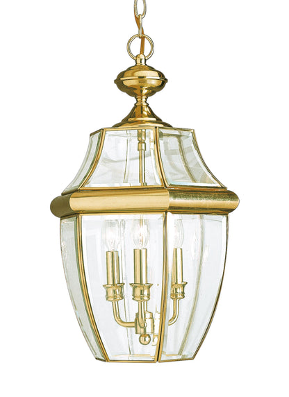 Lancaster traditional 3-light outdoor exterior pendant in polished brass gold finish with clear curved beveled glass shade