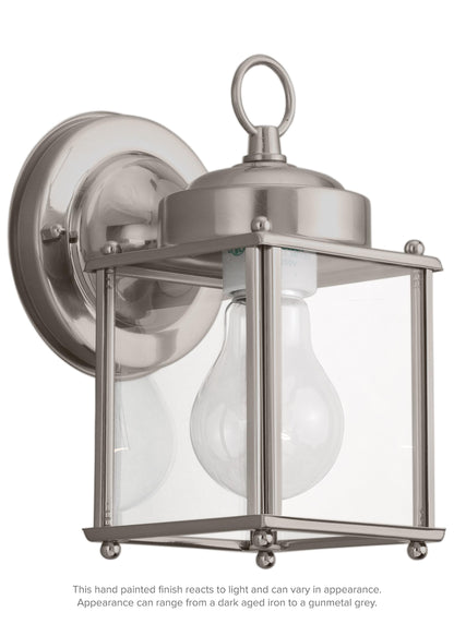 New Castle traditional 1-light outdoor exterior wall lantern sconce in antique brushed nickel silver finish with clear gla...