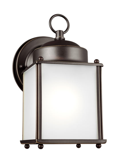 New Castle traditional 1-light outdoor exterior wall lantern sconce in antique bronze finish with clear glass panels