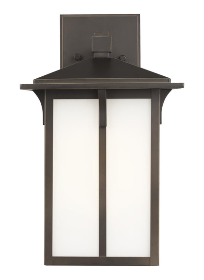Tomek modern 1-light outdoor exterior medium wall lantern sconce in antique bronze finish with etched white glass panels